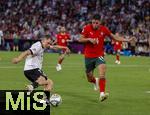 04.06.2025, Fussball UEFA Nations League 2024/25,  Halbfinale, Deutschland - Portugal, in der Allianz-Arena Mnchen. v.li: Florian Wirtz (Deutschland) gegen Goncalo Inacio (Portugal) 