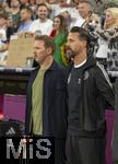 04.06.2025, Fussball UEFA Nations League 2024/25,  Halbfinale, Deutschland - Portugal, in der Allianz-Arena Mnchen. v.li: Trainer Julian Nagelsmann (Deutschland) mit Co-Trainer Sandro Wagner (Deutschland) bei der Hymne.