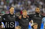04.06.2025, Fussball UEFA Nations League 2024/25,  Halbfinale, Deutschland - Portugal, in der Allianz-Arena Mnchen. Aufstellung zur Nationalhymne, von links:  Robin Koch (Deutschland), Maximilian Mittelstdt (Deutschland), Jonathan Tah (Deutschland), 
