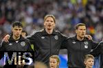 04.06.2025, Fussball UEFA Nations League 2024/25,  Halbfinale, Deutschland - Portugal, in der Allianz-Arena Mnchen. Aufstellung zur Nationalhymne, von links:  Aleksandar Pavlovic (Deutschland), Nick Woltemade (Deutschland), Leon Goretzka (Deutschland), 