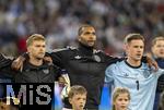 04.06.2025, Fussball UEFA Nations League 2024/25,  Halbfinale, Deutschland - Portugal, in der Allianz-Arena Mnchen. Aufstellung zur Nationalhymne, von links:  Maximilian Mittelstdt (Deutschland), Jonathan Tah (Deutschland), Torwart Marc Andre ter-Stegen (Deutschland), 
