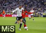 04.06.2025, Fussball UEFA Nations League 2024/25,  Halbfinale, Deutschland - Portugal, in der Allianz-Arena Mnchen. v.li: Leroy Sane (Deutschland) gegen Nuno Mendes (Portugal) 