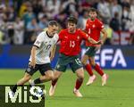 04.06.2025, Fussball UEFA Nations League 2024/25,  Halbfinale, Deutschland - Portugal, in der Allianz-Arena Mnchen. v.li: Florian Wirtz (Deutschland) gegen Joao Neves (Portugal) am Ball 