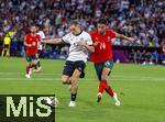 04.06.2025, Fussball UEFA Nations League 2024/25,  Halbfinale, Deutschland - Portugal, in der Allianz-Arena Mnchen. v.li: Florian Wirtz (Deutschland) gegen Goncalo Inacio (Portugal) 