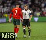 04.06.2025, Fussball UEFA Nations League 2024/25,  Halbfinale, Deutschland - Portugal, in der Allianz-Arena Mnchen. v.li: Cristiano Ronaldo (Portugal), Joshua Kimmich (Deutschland) 