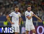 05.06.2025, Fussball UEFA Nations League 2024/25,  Halbfinale, Spanien - Frankreich, in der MHP-Arena Stuttgart, v.l. Clement Lenglet (Frankreich) und Adrien Rabiot (Frankreich) sind unzufrieden.
