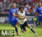 08.06.2025, Fussball UEFA Nations League 2024/25,  Spiel um Platz 3, Deutschland - Frankreich, in der MHP-Arena Stuttgart, Adrien Rabiot (Frankreich) foult Karim Adeyemi (Deutschland) 