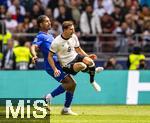 08.06.2025, Fussball UEFA Nations League 2024/25,  Spiel um Platz 3, Deutschland - Frankreich, in der MHP-Arena Stuttgart, v.li: Loic Bade (Frankreich) gegen Leon Goretzka (Deutschland) 