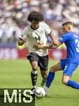 08.06.2025, Fussball UEFA Nations League 2024/25,  Spiel um Platz 3, Deutschland - Frankreich, in der MHP-Arena Stuttgart, v.li: Karim Adeyemi (Deutschland) gegen Lucas Digne (Frankreich) 