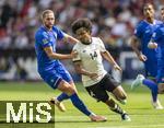 08.06.2025, Fussball UEFA Nations League 2024/25,  Spiel um Platz 3, Deutschland - Frankreich, in der MHP-Arena Stuttgart, v.li: Adrien Rabiot (Frankreich) gegen Karim Adeyemi (Deutschland) 