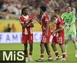 21.06.2025, FIFA Club World Cup 2025, Gruppe C, FC Bayern Mnchen - CA Boca Juniors, im Hard-Rock-Stadium in Miami, Florida (USA),  v.li: Michael Olise (FC Bayern Mnchen), Kingsley Coman (FC Bayern Mnchen), Raphael Guerreiro (FC Bayern Mnchen) 