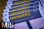 28.03.2023, Lotto Bayern, Eurojackpot-Scheine, Angekreuzte Tippscheine auf dem Tisch. 