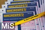 28.03.2023, Lotto Bayern, Eurojackpot-Scheine, Angekreuzte Tippscheine auf dem Tisch. 