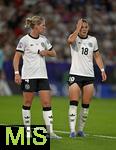 19.07.2025, UEFA Frauen-Europameisterschaft 2025 in der Schweiz. Viertelfinale, Frankreich - Deutschland, im St-Jakob-Park Basel (Schweiz). Rebecca Knaak (Deutschland) und Giovanna Hoffmann (Deutschland) nachdenklich.