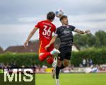 25.07.2025, Fussball 1. Bundesliga 2025/2026,  Testspiel Rot-Weiss Essen - FC Augsburg, im Donaustadion Dillingen, Schwaben. v.li: Mert Kmr (FC Augsburg) gegen Jannik Hofmann (Essen).

