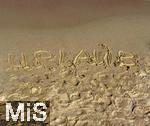 23.07.2025,  Beliebtes Reiseziel der Deutschen, Mallorca. Hier Cala Ratjada am Strand Cala Agulla. Urlaub Schrifzug im Sandstrand, 
