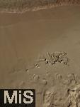 23.07.2025,  Beliebtes Reiseziel der Deutschen, Mallorca. Hier Cala Ratjada am Strand Cala Agulla. Urlaub Schrifzug im Sandstrand, bereits von der Brandung verwischt.