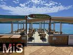 23.07.2025,  Beliebtes Reiseziel der Deutschen, Mallorca. Hier Cala Ratjada an der Hafenpromenade. Strandrestaurant Xiringuito an der Son Moll.