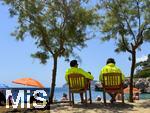 23.07.2025,  Beliebtes Reiseziel der Deutschen, Mallorca. Hier Cala Ratjada am Strand Cala Gat. Zwei Rettungsschwimmer berwachen den Strand.