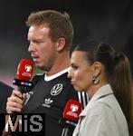 07.09.2025, Fussball WM-Qualifikation Europa 2025/26, 6.Spieltag,  Deutschland - Nordirland, im Rhein-Energie-Stadion Kln, Trainer Julian Nagelsmann (Deutschland) und Laura Wontorra (re, Deutschland).   