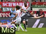 04.10.2025, Fussball 1. Bundesliga 2025/2026, 6.Spieltag, FC Augsburg - VfL Wolfsburg, in der WWK-Arena Augsburg. v.l. Han-Noah Massengo (FC Augsburg) gegen Dzenan Pejcinovic (Wolfsburg) 
 

