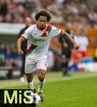 04.10.2025, Fussball 1. Bundesliga 2025/2026, 6.Spieltag, FC Augsburg - VfL Wolfsburg, in der WWK-Arena Augsburg. Han-Noah Massengo (FC Augsburg) Schuss.