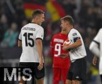 10.10.2025, Fussball WM-Qualifikation Europa 2025/26, 7.Spieltag,  Deutschland - Luxemburg, in der PreZero-Arena (Sinsheim). Joshua Kimmich (Deutschland) redet mit Nico Schlotterbeck (Deutschland) .