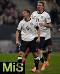 10.10.2025, Fussball WM-Qualifikation Europa 2025/26, 7.Spieltag,  Deutschland - Luxemburg, in der PreZero-Arena (Sinsheim). v.l. Joshua Kimmich (Deutschland) und Nick Woltemade (Deutschland) jubeln.