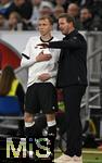 10.10.2025, Fussball WM-Qualifikation Europa 2025/26, 7.Spieltag,  Deutschland - Luxemburg, in der PreZero-Arena (Sinsheim). v.l. Maximilian Beier (Deutschland) und National-Trainer Julian Nagelsmann (Deutschland) im Gesprch vor der Einwechslung