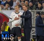 10.10.2025, Fussball WM-Qualifikation Europa 2025/26, 7.Spieltag,  Deutschland - Luxemburg, in der PreZero-Arena (Sinsheim). Maximilian Beier (Deutschland) bekommt von National-Trainer Julian Nagelsmann (Deutschland) Anweisungen