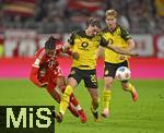 18.10.2025, Fussball Bundesliga 2025/2026, 7.Spieltag, FC Bayern Mnchen - Borussia Dortmund, in der Allianz-Arena Mnchen,  v.l. Michael Olise (FC Bayern Mnchen) gegen Marcel Sabitzer (Borussia Dortmund) 


