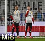 14.11.2025, Fussball WM-Qualifikation Europa 2025/26, 9.Spieltag,  Luxemburg - Deutschland, im Stade de Luxembourg (Croix de Gasperich, Luxemburg), v.l. Torwart Finn Dahmen (Deutschland) und  Jonathan Burkhardt  (Deutschland)