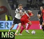 14.11.2025, Fussball WM-Qualifikation Europa 2025/26, 9.Spieltag,  Luxemburg - Deutschland, im Stade de Luxembourg (Croix de Gasperich, Luxemburg), v.l. Nick Woltemade (Deutschland) setzt sich durch gegen Seid Korac (Luxemburg) .