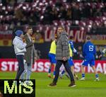 17.11.2025, Fussball WM-Qualifikation Europa 2025/26, 10.Spieltag,  Deutschland - Slowakei, in der Red-Bull-Arena Leipzig (Deutschland). ZDF-Experten auf dem Platz, von links:  Katrin M�ller Hohenstein, mit Christoph Kramer und Per Mertesacker.