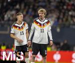 17.11.2025, Fussball WM-Qualifikation Europa 2025/26, 10.Spieltag,  Deutschland - Slowakei, in der Red-Bull-Arena Leipzig (Deutschland). v.li: Nico Schlotterbeck (Deutschland), Nick Woltemade (Deutschland) nachdenklich 