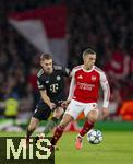 26.11.2025,  Fussball UEFA Championsleague 2025/2026: Vorrunde 5.Spieltag, FC Arsenal - FC Bayern M�nchen, im Emirates-Stadion London (England), v.li: Aleksandar Pavlovic (Bayern M�nchen)  gegen Leandro Trossard (FC Arsenal) 
