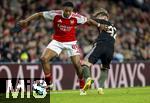 26.11.2025,  Fussball UEFA Championsleague 2025/2026: Vorrunde 5.Spieltag, FC Arsenal - FC Bayern M�nchen, im Emirates-Stadion London (England), v.li: Myles Lewis-Skelly (FC Arsenal) gegen Lennart Karl (FC Bayern M�nchen) 
