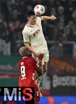 27.02.2026, Fussball 1. Bundesliga 2025/2026, 24.Spieltag, FC Augsburg - 1.FC K�ln, in der WWK-Arena Augsburg. v.l. Ragnar Ache (1.FC K�ln) gegen Keven Schlotterbeck (FC Augsburg) 
 

