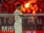 27.02.2026, Fussball 1. Bundesliga 2025/2026, 24.Spieltag, FC Augsburg - 1.FC Köln, in der WWK-Arena Augsburg. Kristjan Jakic (FC Augsburg) im Schein der Pyros
