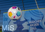 02.03.2026, Fussball  Eröffnung Niederlassung Mädchen an den Ball, an der Maiacher Schule in Nürnberg, Fussball fliegt durch die Luft, vor dem Logo von Mädchen. an den Ball.