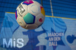 02.03.2026, Fussball  Eröffnung Niederlassung Mädchen an den Ball, an der Maiacher Schule in Nürnberg, Fussball fliegt durch die Luft, vor dem Logo von Mädchen. an den Ball.