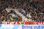 06.03.2026, Fussball Bundesliga 2025/2026, 25.Spieltag, FC Bayern München - Borussia Mönchengladbach, in der Allianz-Arena München, Mitarbeiter von Telekom bilden das T mit ihrer weissen Kleidung auf der Tribüne.