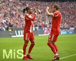 21.03.2026, Fussball Bundesliga 2025/2026, 27.Spieltag, FC Bayern München - 1.FC Union Berlin, in der Allianz-Arena München,      v.l. Michael Olise (FC Bayern München) und Harry Kane (FC Bayern München)  jubeln

