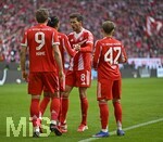 21.03.2026, Fussball Bundesliga 2025/2026, 27.Spieltag, FC Bayern München - 1.FC Union Berlin, in der Allianz-Arena München,      v.l. Harry Kane (FC Bayern München), Michael Olise (FC Bayern München), Leon Goretzka (FC Bayern München) und Lennart Karl (FC Bayern München) jubeln

