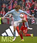 21.03.2026, Fussball Bundesliga 2025/2026, 27.Spieltag, FC Bayern München - 1.FC Union Berlin, in der Allianz-Arena München,      v.l. Alex Kral (Union Berlin) gegen Josip Stanisic (Bayern München) 


