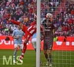 21.03.2026, Fussball Bundesliga 2025/2026, 27.Spieltag, FC Bayern München - 1.FC Union Berlin, in der Allianz-Arena München,      v.l. Harry Kane (FC Bayern München) gegen Torwart Frederik Rönnow (Union Berlin) 


