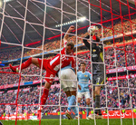 21.03.2026, Fussball Bundesliga 2025/2026, 27.Spieltag, FC Bayern München - 1.FC Union Berlin, in der Allianz-Arena München,  li: Harry Kane (FC Bayern München) gegen Torwart Frederik Rönnow (Union Berlin) 