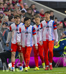 21.03.2026, Fussball Bundesliga 2025/2026, 27.Spieltag, FC Bayern München - 1.FC Union Berlin, in der Allianz-Arena München, Nachwuchsspieler kommen vom Aufwärmen, Guido Della Rovere (FC Bayern München), Deniz Ofli (FC Bayern München), Filip Pavic (FC Bayern München), Erblin Osmani (Bayern München) 