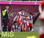 21.03.2026, Fussball Bundesliga 2025/2026, 27.Spieltag, FC Bayern München - 1.FC Union Berlin, in der Allianz-Arena München, Guido Della Rovere (FC Bayern München) und Maycon Cardozo (Bayern München) kommen aus den Katakomben 