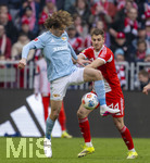 21.03.2026, Fussball Bundesliga 2025/2026, 27.Spieltag, FC Bayern München - 1.FC Union Berlin, in der Allianz-Arena München, v.li: Alex Kral (Union Berlin) gegen Josip Stanisic (Bayern München) 
